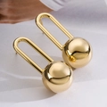 Modern minimalist gold sphere drop earrings with U-shaped hooks and metallic finish - Gold