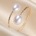 Minimalist gold-filled open ring featuring two white freshwater pearls on a spiral band - Single Layer White