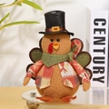 Detail of Thanksgiving turkey plush with maple leaf vest and black top hat decoration - Black Top Hat Turkey Male