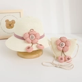 Detail of kids straw sun hat and matching bag with pink floral and bead accents - Hat + Bag Set / Cream
