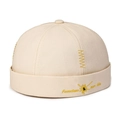 Beige docker cap with yellow sun embroidery and Freedom & sun like text detail - Adjustable / Beige