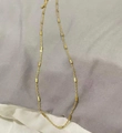 Golden titanium steel bamboo link chain necklace with small cylindrical beads - Water Wave Chain / Gold