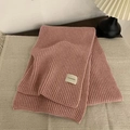 Knitted winter scarf in soft pink rib-knit texture with a small logo brand label - Approx. 160cm / Pink
