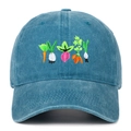 Close-up of vibrant vegetable embroidery on a washed blue cotton denim baseball cap - Lake Blue