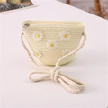 Detailed view of yellow straw bag with daisy embroidery and soft braided shoulder strap - Little Fairy Style / Cream