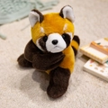 Plush red panda snap bracelet toy with soft orange fur and realistic striped tail detail - Raccoon / 18cm