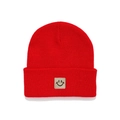 Kids red knit beanie with cute smiley face patch for warm winter fashion and wind protection - Red