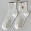 Mid-calf ribbed cotton socks in creamy white featuring cute brown rabbit embroidery - One Size / White