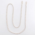 Detail of golden metal chain woven with white leather and lobster clasps for bags - White