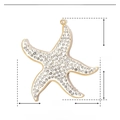 Macro shot of 34mm gold-plated starfish pendant with crystals and stainless steel detail - Large Sea Star/YE609