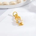 Detailed view of a gold girl pendant with a pear-shaped cubic zirconia for DIY jewelry - Little Boy - White Zirconia
