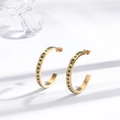 Luxury C-shaped gold-plated hoop earrings with green zircon inlays on white background - Gold Base Green Stone