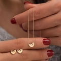 Elegant gold heart jewelry set featuring a necklace and stud earrings on model - Gold Heart Necklace and Stud Earrings Set (6342401HB)