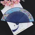 Chinese vintage folding fan in blue with pink cherry blossom pattern and blue silk tassel - Floral Blue Surface Blue Handle