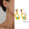Bohemian gold stainless steel earrings with iridescent teardrop stone and green bead - Zjge0482
