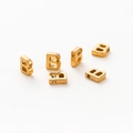 Detailed view of six 18k vacuum gold-plated alphabet B beads for DIY jewelry making - Letter B / Gold