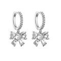 Detail of silver bow earrings featuring a central heart-shaped cubic zirconia and pavé stones - Silver Bowknot 1 Pair