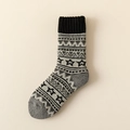 Winter wool socks in black and grey featuring Nordic star and geometric patterns - One Size / Black