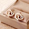 Boucles d'oreilles double boucle en acier titane or rose avec chiffres romains et cristaux - Boucles d'oreilles clous / Or rose