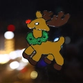 Christmas window sticker featuring a cartoon reindeer with glitter neck collar decoration - Christmas Reindeer