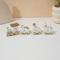 Close-up of painted wooden Christmas train with polar bear and snowman figurines - 4-Section Classic White