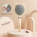 Beige bear-shaped air cushion hairbrush featuring a built-in pink cleaning claw tool - Bear Comb (Beige)