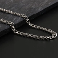 Polished silver stainless steel Cuban link chain necklace on a dark marble background - 8mm * 45cm