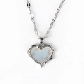Detailed macro of vintage silver heart necklace with white shell inlay and zircon stones - Irregular Heart Side Three Zircons Style (Style 6 White Gold) / Silver