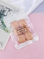 Detail of 6 skin-tone square breast tape pieces in fashion style zip packaging - 6Pcs Square Brown + OPP Bag