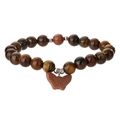 Macro shot of tiger eye beaded bracelet featuring a sparkling sandstone butterfly charm - Yellow Tiger Eye + Gold Sand Stone