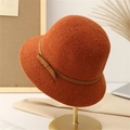 Elegant rust red knit cloche bucket hat with delicate bow detail on display stand - M (56-58cm) / Brick Red