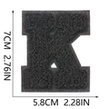 Detail showing letter K chenille patch with 7cm height dimensions and embroidery texture - Letter K / Black