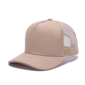 Detailed view of the breathable mesh back and curved brim on this khaki trucker cap - Khaki