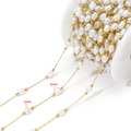 5mm and 6mm white irregular pearl chain with gold beads on a white plastic spool - 5*6mm Irregular Oval Pearl