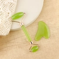 Green resin facial massage set with a dual-head jade roller and heart-shaped gua sha tool - Resin Roller + Transparent Green Gua Sha Board