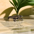 Brass crayfish ornament with antique finish placed on a stone surface as a tea pet decor - Antique Bronze Crawfish