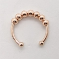 Polished rose gold spinner ring with seven movable anxiety beads and an open adjustable band - Adjustable Open / Rose Gold