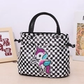 Sparkly black and white checkered sequin handbag with a colorful cartoon unicorn patch - Black Plaid