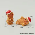 Miniature resin gingerbread man figures with red Santa hats for Christmas dollhouse decor - Standing and Lying Gingerbread Man with Hat Set (2 Pcs)