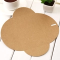 Flat lay of an unfolded brown kraft paper envelope with rounded edges on a wooden desk - Large Envelope
