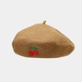 Detailed view of cherry embroidery on a warm brown wool blend beret for women - One Size / Camel