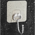Transparent adhesive wall hook with silver metal hook on a waterproof black background - Brushed Hook / Silver