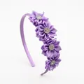 Purple floral headband for girls featuring satin petals and sparkling rhinestone centers - Purple