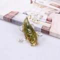 Green crystal koi fish figurine with gold foil accents for office desktop decor - Peridot