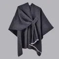 Detail of dark gray knit shawl with textured fabric and white fringe hem decoration - White Fringe with Stripe / Black and Gray