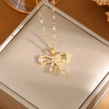Gold plated titanium steel necklace featuring a sparkling full zircon bow pendant - A0108 Gold CZ Bowknot