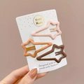 Set of three matte star hair clips in pink, orange and brown on a white card - 4# Star Water Drop Style