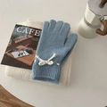 Blue knitted glove featuring a white bow detail and contrast stitching accents - Gloves / Blue