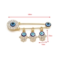 Detail view of Evil Eye and Hamsa brooch showing precise 68mm width dimensions - Gold 3 Charms - Evil Eye Disk