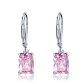 Macro detail of pink cushion-cut zircon earrings with silver leverback hooks - Pink